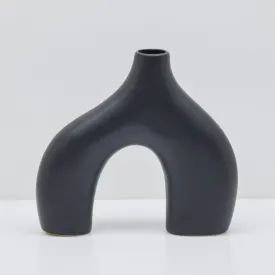Sleek Black Stone Age-Inspired Arch Vase